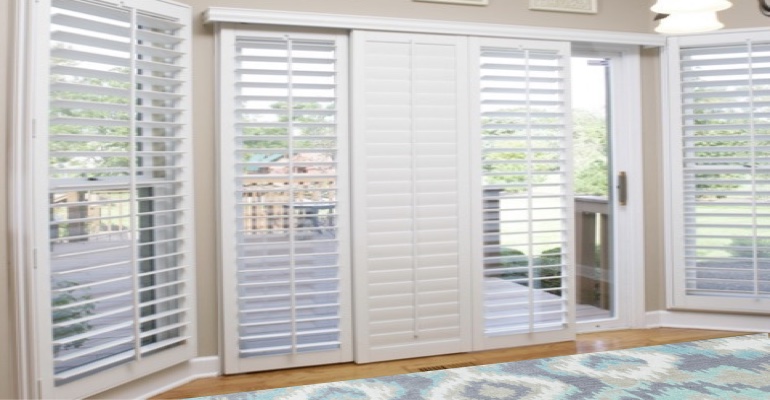 [Polywood|Plantation|Interior ]211] shutters on a sliding glass door in Chicago